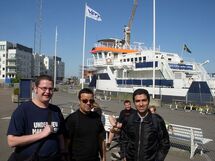 People in a harbor. Photo. 