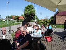 People eating at a restaurant. Photo. 