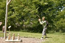 Person swinging a pendulum. Photo. 